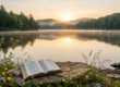 Serene open Bible resting on a rock by a misty lake at sunrise, surrounded by wildflowers, symbolizing peace, healing, and finding calm through God's Word instead of anger.