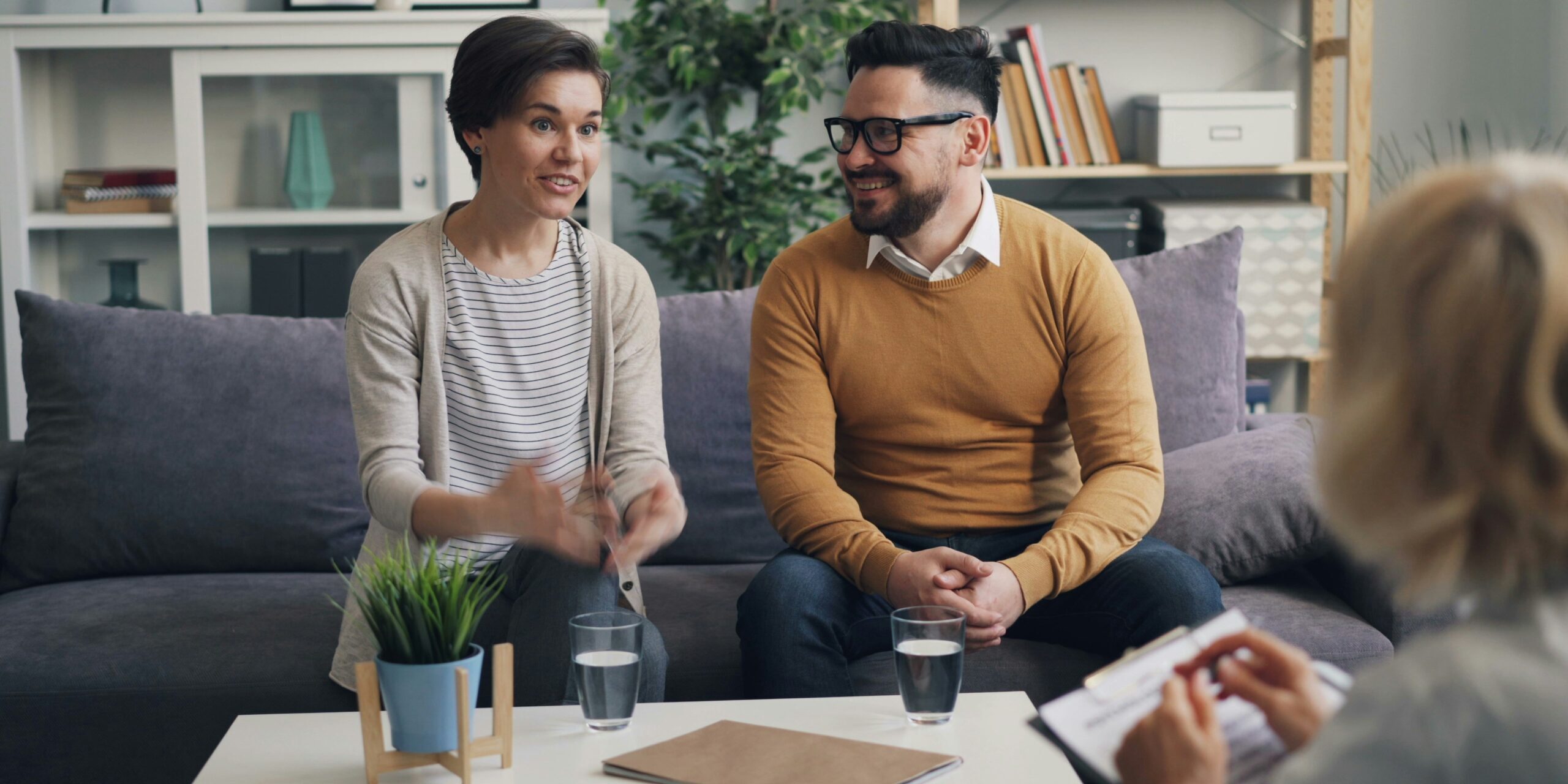must-have-christian-premarital-counseling-kits-and-resources-image Counselor speaking with a couple in a warm office - christian marriage counseling resources