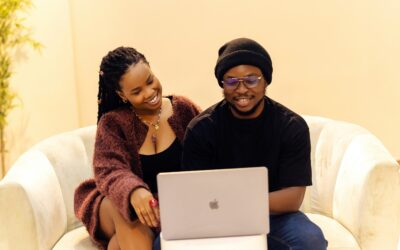 marriage counseling online couple on couch with laptop
