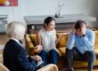 Christian therapy for broken marriages, couple sitting together looking hopeful